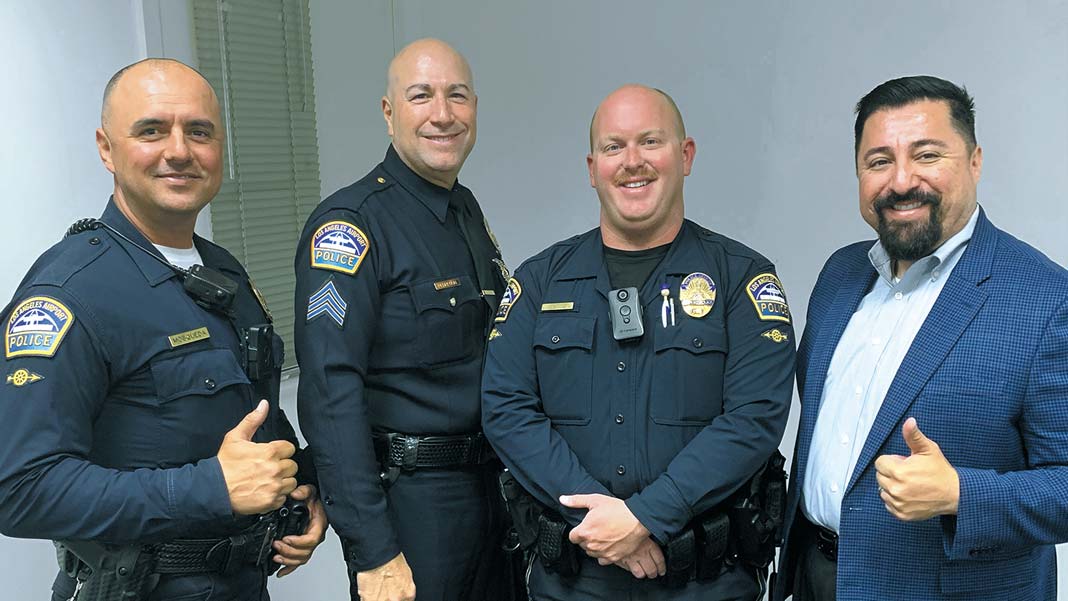With Club COO Robert Larios (right) are Officer Paul Mosqueda, Sgt. Rob Pedregon and Officer Nick Van Dragt, the Airport Police team that created and manages the teddy bear giveaway on Christmas morning.